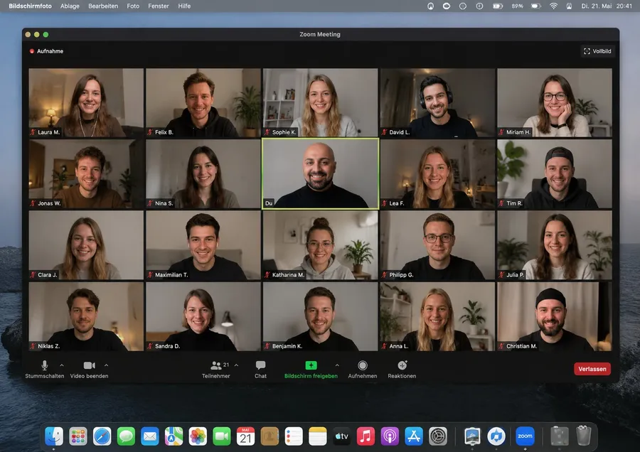 Video call with many participants in gallery view, Ali Mahlodji in the middle