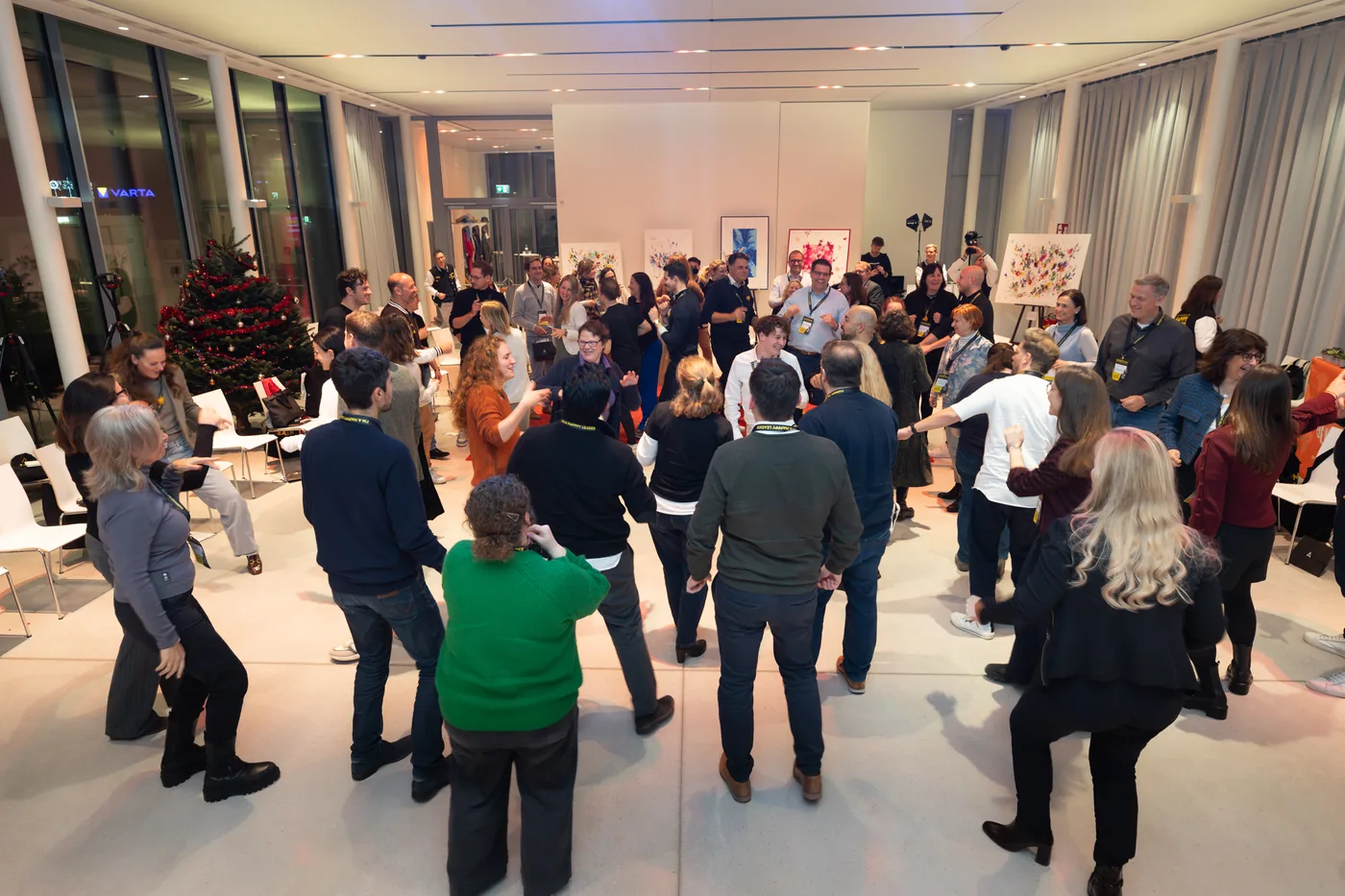 The whole room in motion, participants dancing